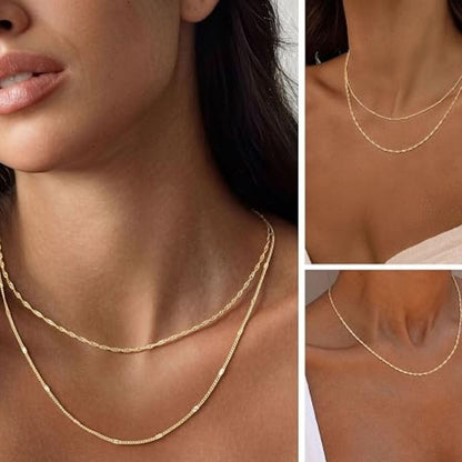 Guldkaskad – Elegant flerskikts halsband i varm guldton